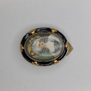Rare antique circa 1930s black enamel portrait dress clip